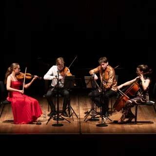 Looking ahead to November, the Ligeti Quartet return to the Barbican, as part of the new Fragile Earth: Sounds of a Living Planet series that runs from September through to March. Their concert, on the 27th November is called Sunrise Missions, and it traces the shifting contours of memory, nature and change through music by Kaijja Saariaho, John Luther Adams, Wadada Leo Smith and others.

The concert includes the world premiere of a new piece by London based composer Blasio Kavuma. Full programme below:

Kaija Saariaho - Terra Memoria
Wadada Leo Smith - String Quartet No 5 ‘In the Diaspora: Earthquakes and Sunrise Missions'
Ayanna Witter-Johnson - Earth
Cassandra Miller - Warbleworks 1-4
Blasio Kavuma - New work (co-commissioned by the Barbican and SHM Foundation)
John Luther Adams - The Wind in

https://www.barbican.org.uk/whats-on/2025/event/ligeti-quartet-sunrise-missions

Photos:
1 - Ligeti Quartet © Patrick Young
2 - Ligeti Quartet with Wadada Leo Smith at their performance of String Quartet No.3 at the Huddersfield Contemporary Music Festival

@barbicancentre @theligetiquartet @hcmfuk
