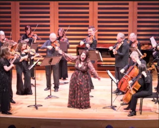 Elizabeth Watts performed with the Britten Sinfonia this week, singing Britten's Les Illuminations. The concert at Kings Place in London was reviewed by Flora Wilson for The Guardian, who said "soprano Elizabeth Watts was relentlessly communicative and in total expressive control from her harshest lower register to the creamiest top notes, while the Britten Sinfonia revelled in the score’s rotation of solo lines, impish pizzicato and fierce, characterful details."

Read the full review here:
https://www.theguardian.com/music/2026/may/17/britten-sinfonia-in-america-review-kings-place

📸 - Shoël Stadlen

@brittensinfonia1 @lizwattssoprano @kingsplacelondon